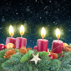 advent wreath with burning candles 