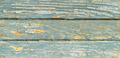 wooden planks painted peeling old paint