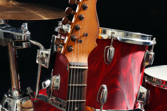 Musical instruments on a stage on dark background