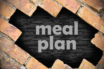 Hole in the brick wall with word meal plan - 97671735