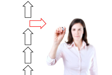 Businesswoman drawing arrows in different directions. Isolated on white.
