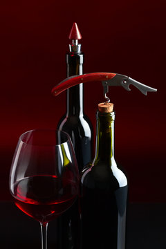 red wine and corkscrew
