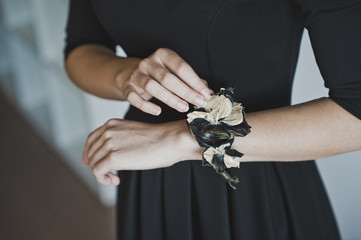 The corsage on the girls hand 4470.