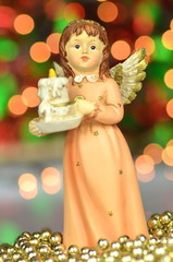 dekoracja bożonarodzeniowa, figurka aniołka na tle bokeh
 - obrazy, fototapety, plakaty