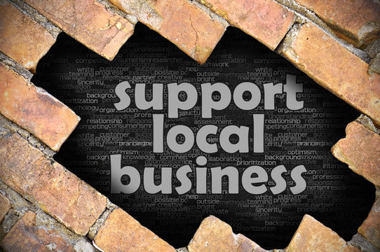 Hole In The Brick Wall With Word Support Local Business