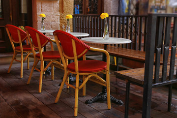 Fototapeta na wymiar Tables and chairs in cafe