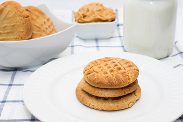 peanut butter cookies on a white plate 