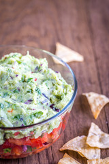 Bowl of guacamole with salsa