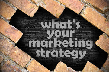 Hole in the brick wall with word what's your marketing strategy