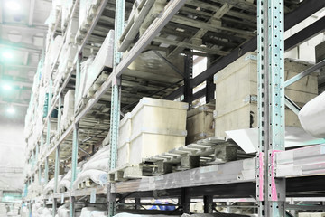 The image of shelves in the warehouse