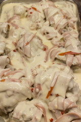 braised chicken on white sauce