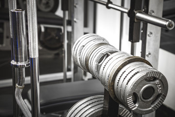 Weights in a Gym.
Gym interior close up, machinery and weightlifting equipment.