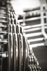 Weights in a Gym.
Gym interior close up, machinery and weightlifting equipment.