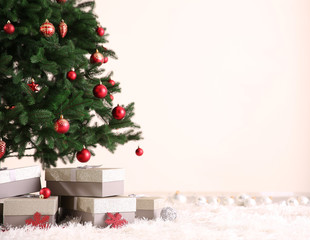 Christmas tree with presents on the floor