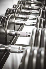 Weights in a Gym.
Gym interior close up, machinery and weightlifting equipment.