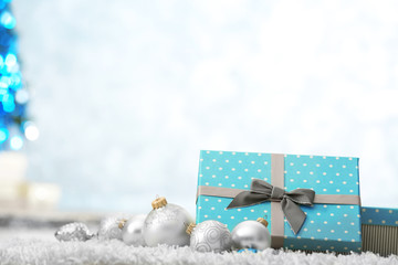 Christmas presents on carpet in room