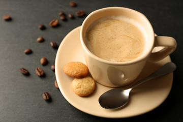 Cup of coffee on gray background