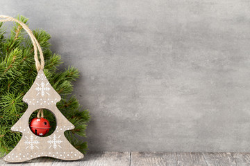 Christmas fir branch and decor, on the vintage background.