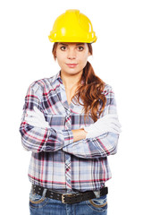 Young woman in yellow construction helmet