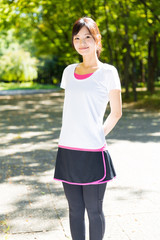 young asian woman jogging image