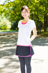 young asian woman jogging image