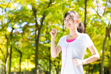 Fototapeta premium young asian woman jogging image