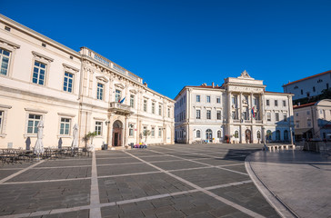 Town Hall and City Library Buildings on Tartini Square in Piran, Slovenia on a Hot Summer Day with Clear Blue Sky