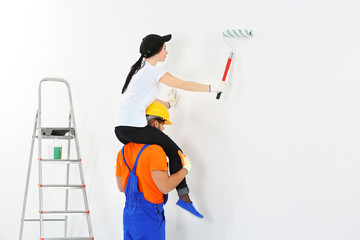 Fototapeta premium Couple renewing apartment indoor