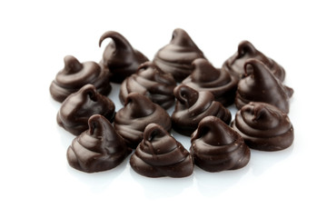 Chocolate morsels isolated on white