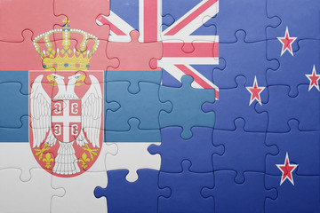 puzzle with the national flag of serbia and new zealand