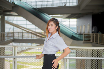 young attractive asian  girl in a uniform of university ,Cute sc