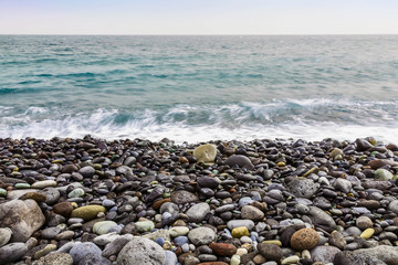 Stone Coast of Ocean with Waves