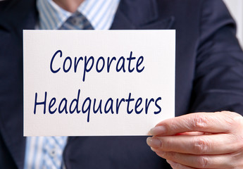 Corporate Headquarters - Manager with sign and text