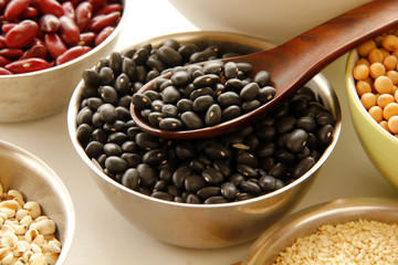 black beens are on white background.