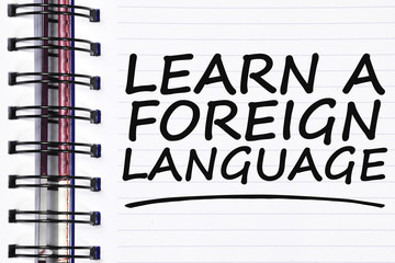 learn a foreign language words on spring white note book