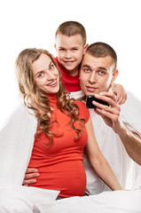 Happy pregnant family