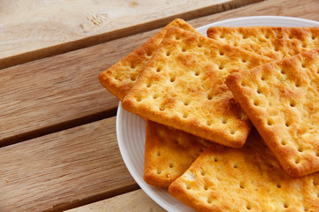 Many Yummy Square Cream Crackers For the best healthy foods and quick easy food composition are on the Earth tone scene. Dessert Concept.