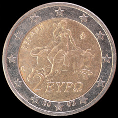 National side of Greece two euro coin on black background