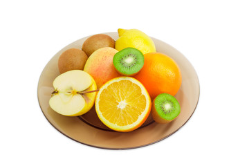 Different fruits on a glass dish