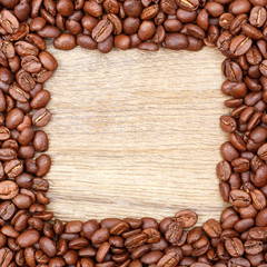 Frame of Coffee Beans, Wooden Background: "Coffee" white letters
