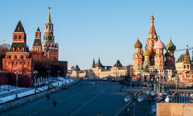 Fototapeta premium Red Square.The Spasskaya Tower.St Basil's Church/Winter in Moscow, Russia