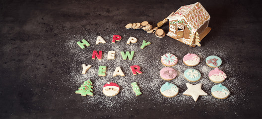 Happy new year written with cookies. Christmas concept. Background.
