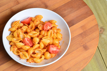 Image of tasty pasta with tomato pesto