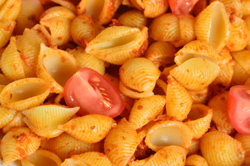 Image of tasty pasta with tomato pesto