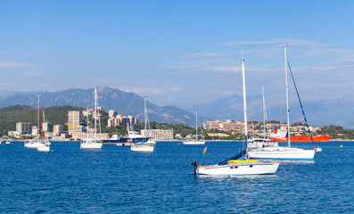 Fototapeta premium Sailing yachts and pleasure motorboats moored