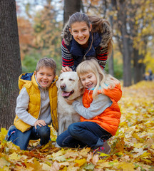 Kids with his dog labrador