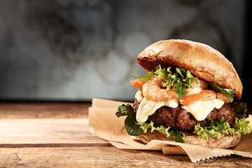 Tasty grilled prawn and beef burger