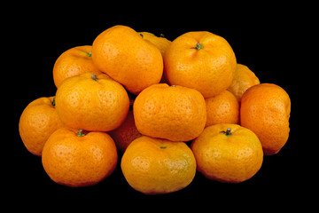 Small Mandarin Oranges on Black Background