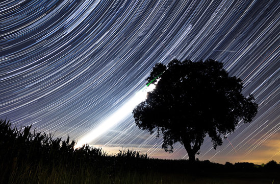 Beautiful star trail image during the night of the Perseid meteor shower in the summer of 2012 in the Netherlands 