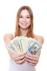 Attractive young woman holding us dollar notes. All on white background.